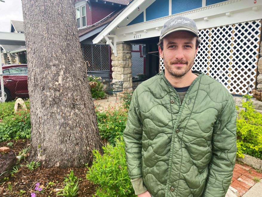 Jason Carron standing in a yard featuring all native perennials.